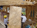 Lifting yet another roof panel.